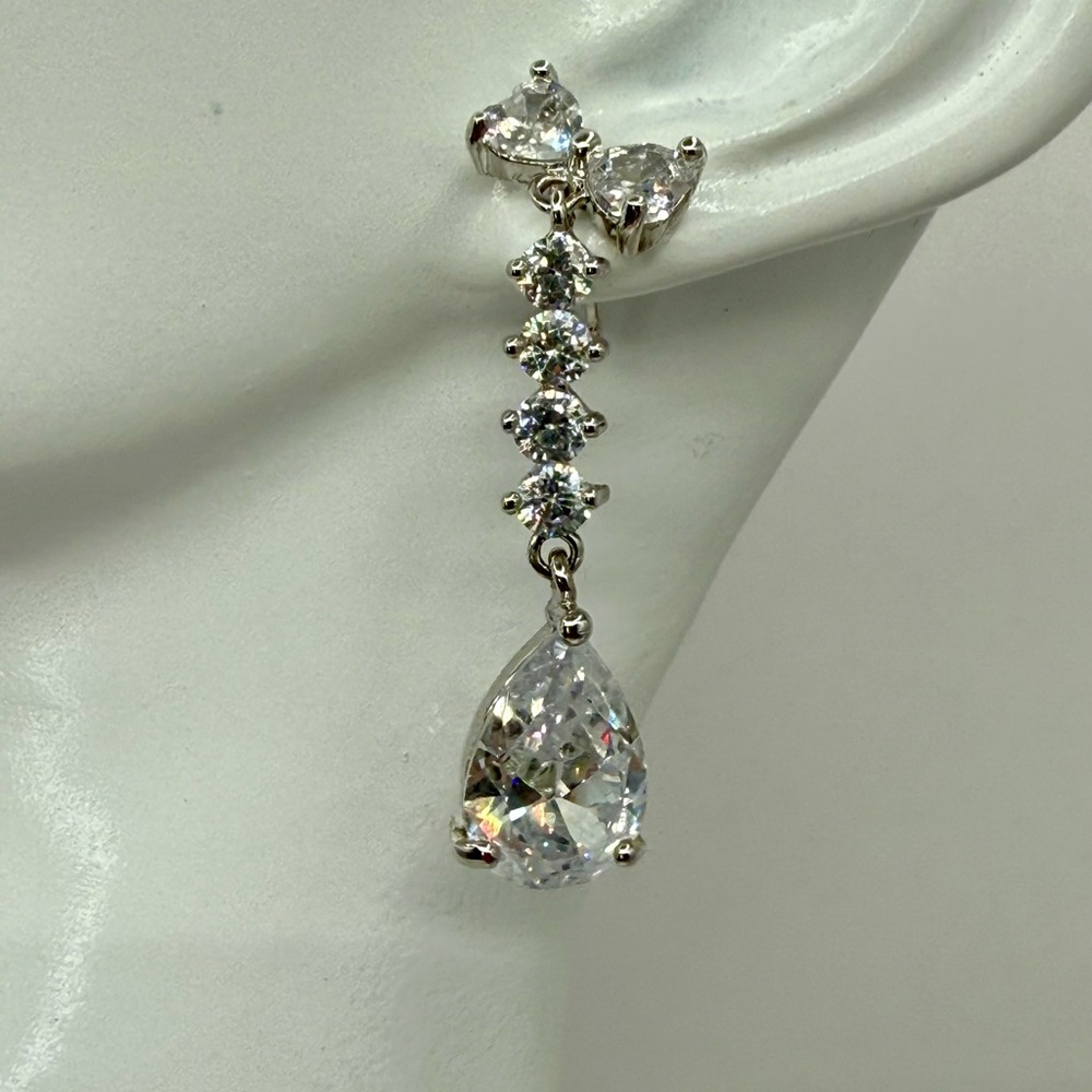 EUC Crystal Dangle Faceted Earrings 2” in length Pierced w Crystal Bow Up Top